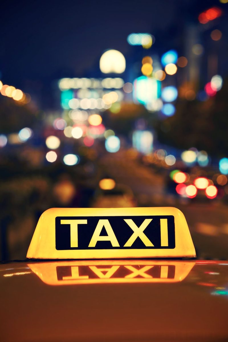 taxi-sign-shines-in-a-city-at-night-2026-03-18-17-46-06-utc.jpg